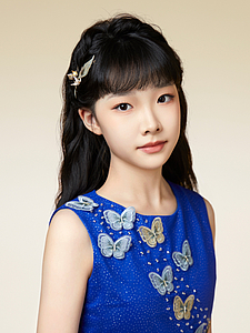 The picture shows a young person with a violin.