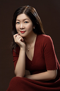 Portrait of a woman in a red dress