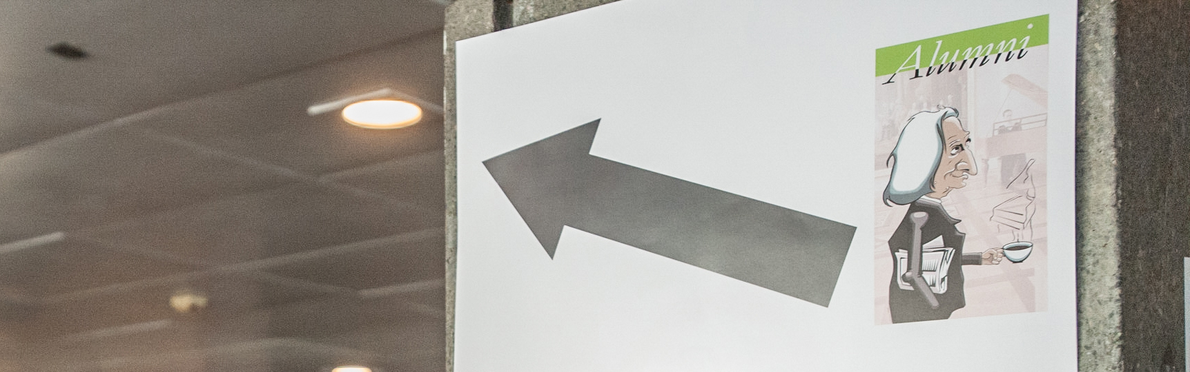 Das Bild zeigt ein Plakat mit einem Pfeil.