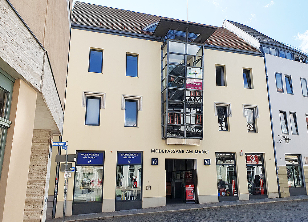 The image shows a modern building.