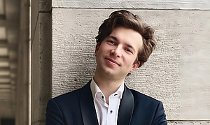 The picture shows a young man. 